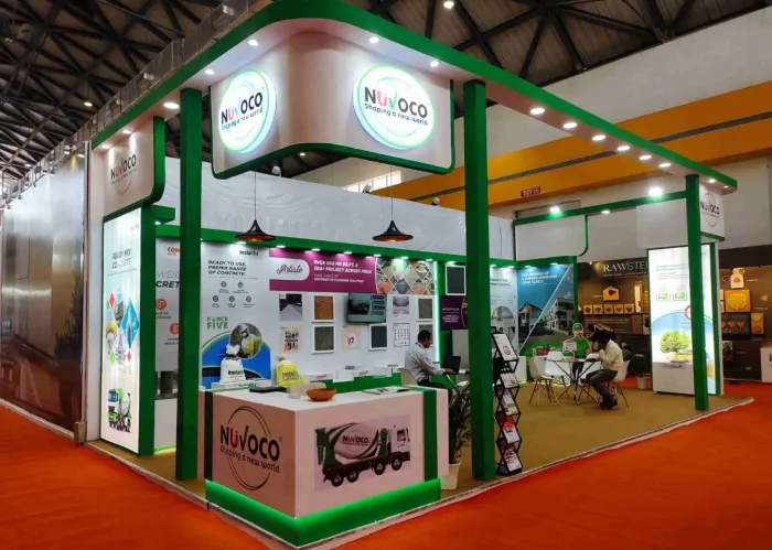 Custom-built Nuvoco exhibition stall featuring 3D branding and fabric graphics by Mixxture.