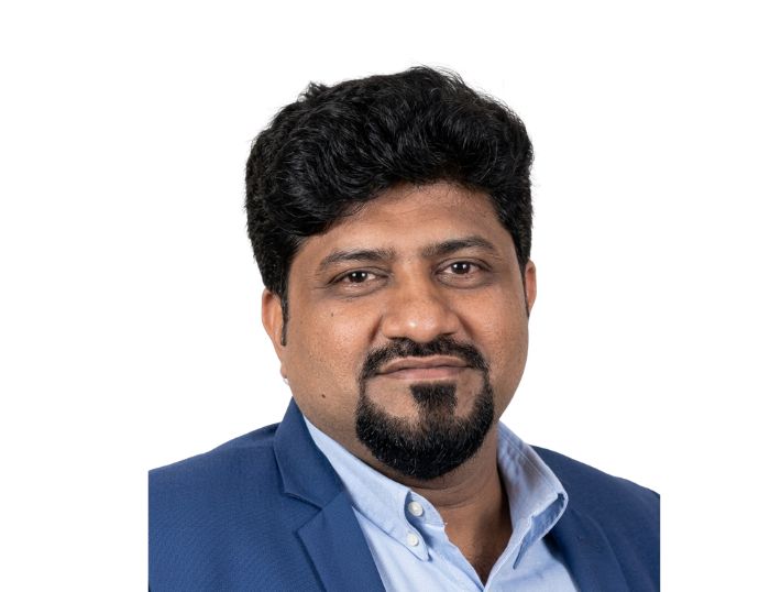 Mr. Vishal Agarwal, Director at Mixxture, professional headshot in an office setting.