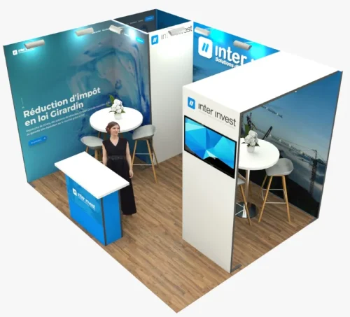 A modern blue and white modular exhibition stand with display counters and a meeting area.